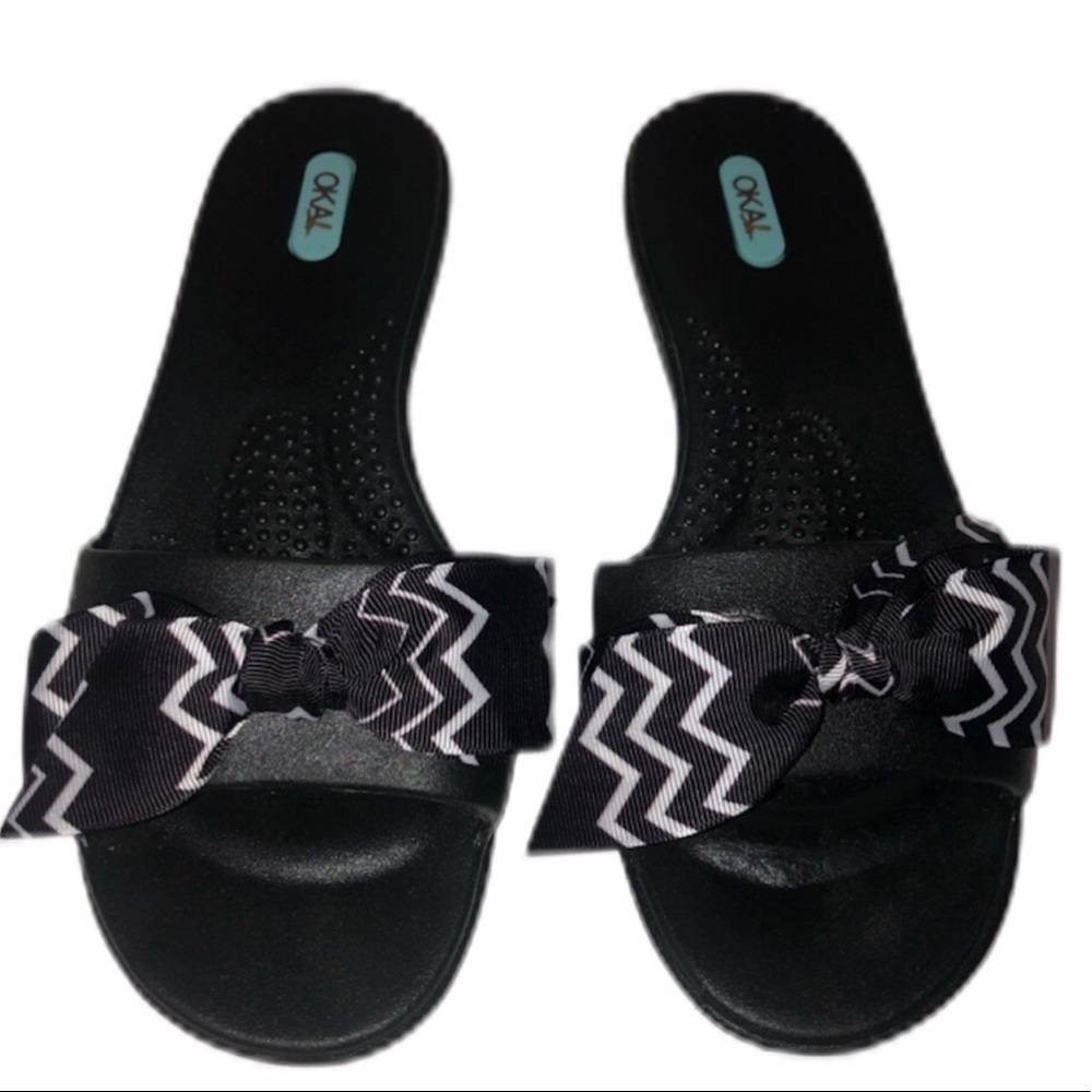 Oka-B slides with black and white bow